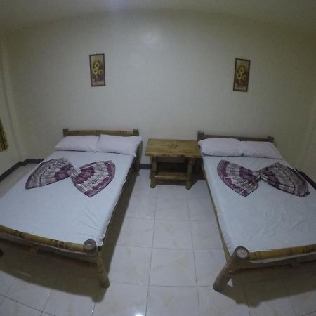 Se San Beach Resort-Isla De Gigantes Carles Bagian luar foto