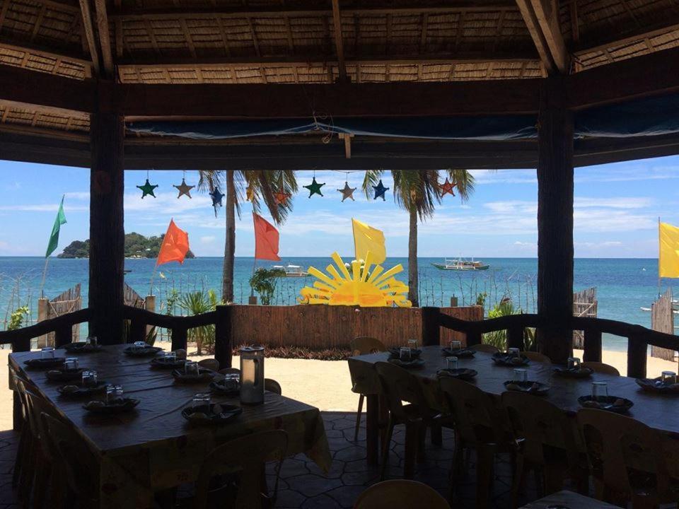 Se San Beach Resort-Isla De Gigantes Carles Bagian luar foto